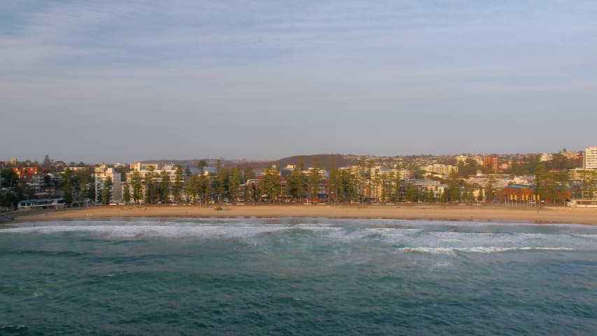 Aerial Image of SUNRISE OVER MANLY BEACH