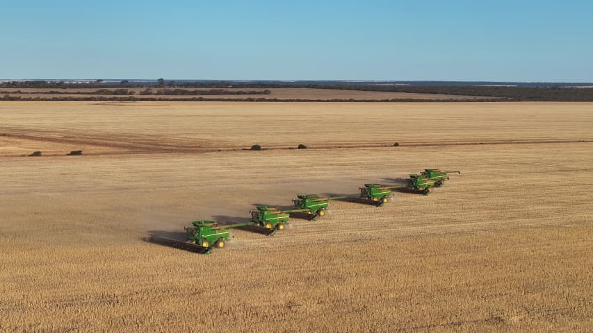 Aerial Image of JOHN DEERE 6 HEADERS HARVESTING