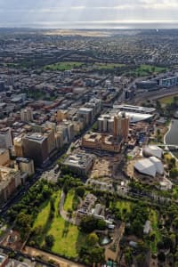 Aerial Image of GOVERNMENT HOUSE AND PARLIAMENT HOUSE LOOKING SOUTH-WEST OVER ADELAIDE CBD