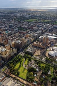 Aerial Image of GOVERNMENT HOUSE AND PARLIAMENT HOUSE LOOKING SOUTH-WEST OVER ADELAIDE CBD