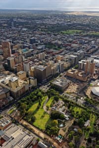 Aerial Image of GOVERNMENT HOUSE AND PARLIAMENT HOUSE LOOKING SOUTH-WEST OVER ADELAIDE CBD