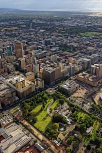 Aerial Image of GOVERNMENT HOUSE AND PARLIAMENT HOUSE LOOKING SOUTH-WEST OVER ADELAIDE CBD