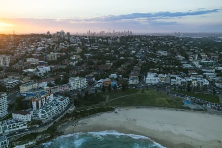 Aerial Image of BONDI, TAMARAMA & SYDNEY SILHOUETTES AT DUSK