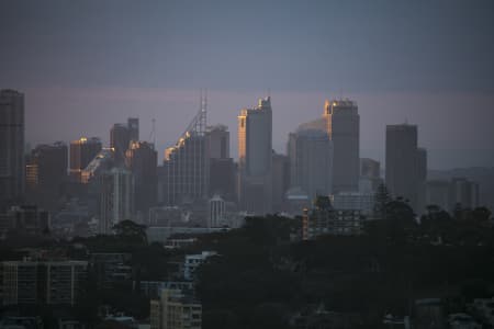 Aerial Image of BONDI, TAMARAMA & SYDNEY SILHOUETTES AT DUSK
