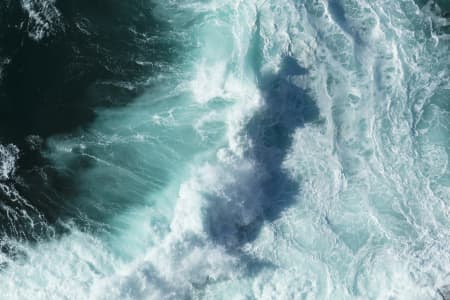 Aerial Image of WAVES CRASHING