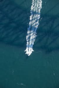 Aerial Image of BRIDGE SHADOWS ON BOATS