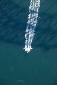 Aerial Image of BRIDGE SHADOWS ON BOATS