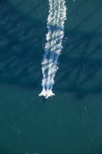 Aerial Image of BRIDGE SHADOWS ON BOATS