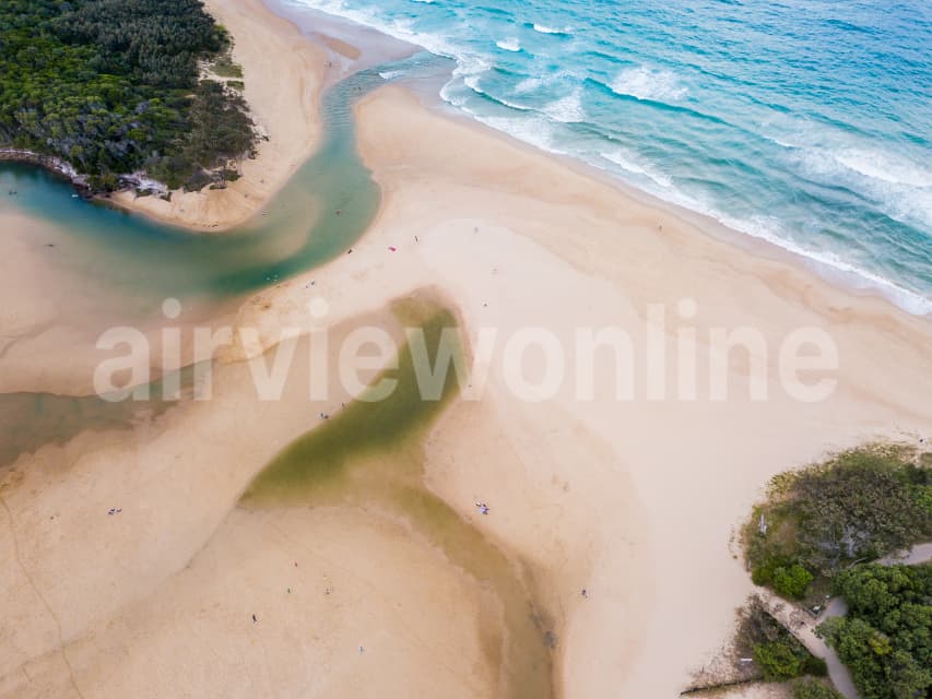 Aerial Image of Currimundi Lake flowing out to sea