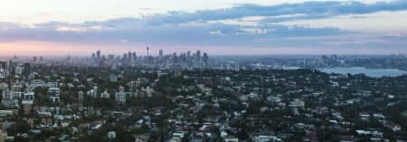 Aerial Image of BONDI, TAMARAMA & SYDNEY SILHOUETTES AT DUSK