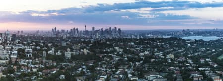 Aerial Image of BONDI, TAMARAMA & SYDNEY SILHOUETTES AT DUSK