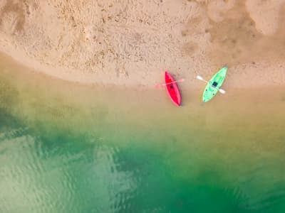 Aerial Image of KAYAKS ON THE BEACH IN THE MAROOCHY RIVER