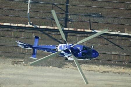 Aerial Image of POLICE HELICOPTER IN FLIGHT.