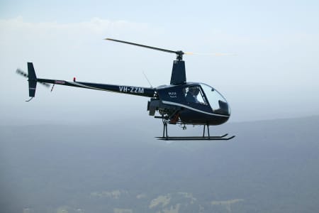 Aerial Image of ROBINSON R22 IN FLIGHT