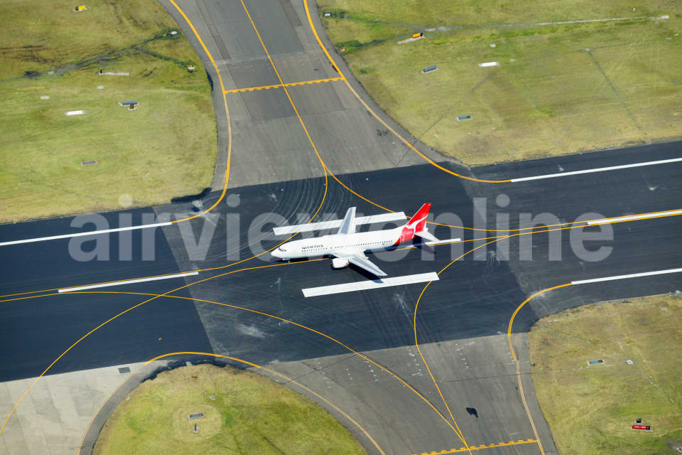 Aerial Image of Rolling Qantas 737