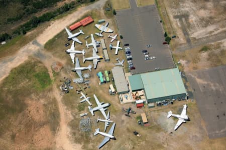 Aerial Image of AIRCRAFT AND HANGER AT BANKSTOWN AIRPORT.