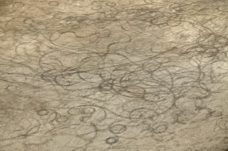 Aerial Image of VEHICLE TRACKS ON DRY LAKE BED.