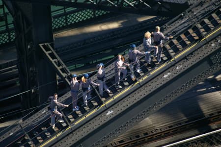 Aerial Image of BRIDGECLIMBERS HOLD TIGHT TO THE SYDNEY HARBOUR BRIDGE.