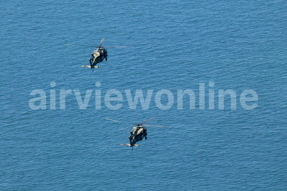 Aerial Image of Two Army Black Hawk Helicopters